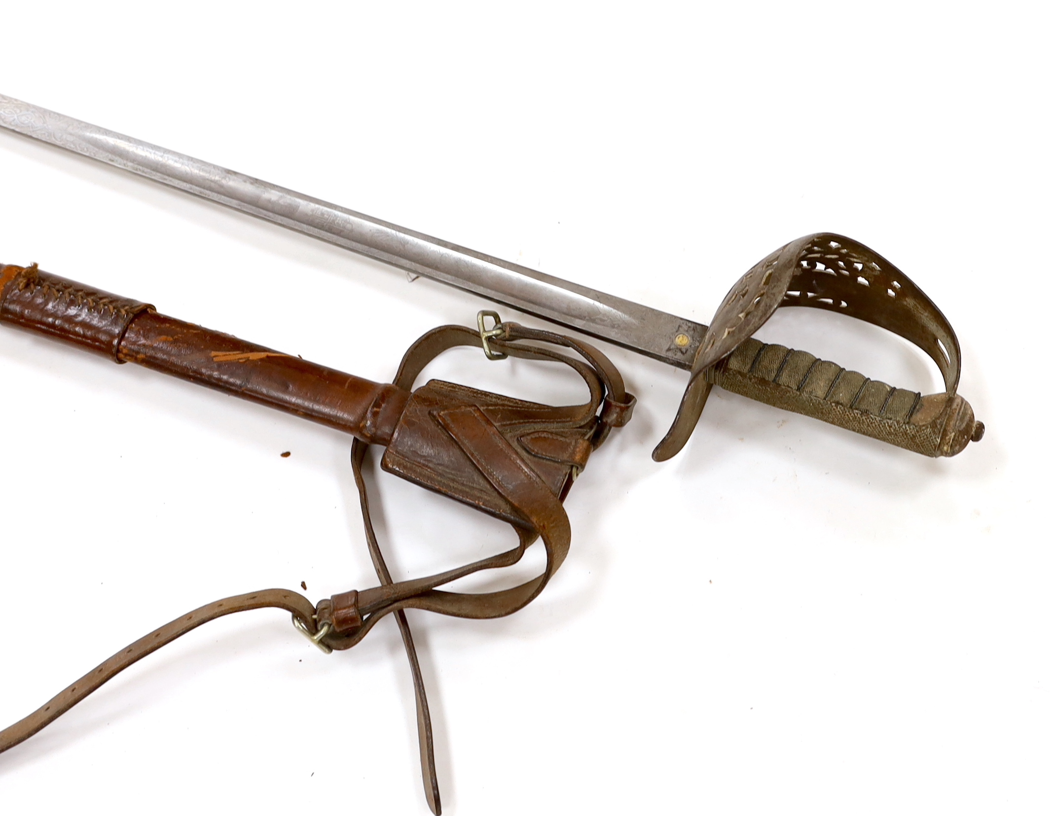 A Victorian 1897 pattern infantry officer's sword, maker Robert Mole & Sons, Birmingham, marked War and India offices, with scabbard and leather hanger, blade 82cm